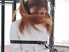 Asian Beauty in Latex Straitjacket Bondage